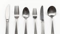 Silver Cutlery Set Displayed on White Surface Royalty Free Stock Photo