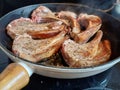 High quality top and lamp chops cooked in an ironcast pan Royalty Free Stock Photo