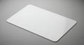 Blank white card mockup on a clean gray backdrop Royalty Free Stock Photo