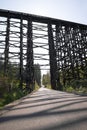 High railway bridge made of wooden typesetting logs