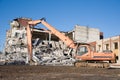 High Reach Excavator machines for demolition of tall building. Machine with hydraulic shears for demolish Royalty Free Stock Photo