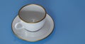 High realism coffee cup isolated on blue background Royalty Free Stock Photo