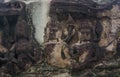 High relief sandstone carvings around the walls of Angkor Wat in Siem Reap