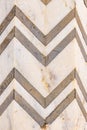 High res ancient natural white travertine marble with dark gray zig zag symmetrical patterns