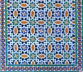 high res close up of historical vibrant colorful shining floral and arabesque tiled wall from Egypt