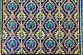 high res historical vibrant colorful shining floral and arabesque tiled wall in Cairo