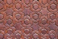 High res intricate arabesque intense red wood egyptian relief extreme close up decorated panel