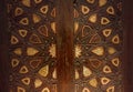 High res intricate arabesque intense wood relief close up decorated door Cairo, Egypt