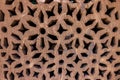 High res intricate arabesque relief decorated pale rough wood wall detail in Cairo, Egypt