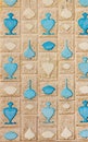 High res natural Valencia cream marble wall with symmetrical sky blue arabesque intricate inlay reliefs
