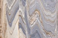 High res old lightly rough multi toned gray, white and cream marble wall extreme close up in natural patterns texture background