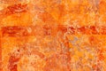 High res old vibrant gradient rich orange earth tone semi smooth stone wall with darker splashes, texture background Royalty Free Stock Photo