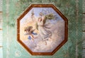 High res pale green stucco painted ceiling detail of religious scene within an octagonal frame texture background