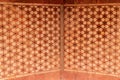 High res pale red sandstone ceiling intricate inlaid decorative panel with arabesque geometric inlay painted pattern