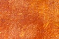 High res semi smooth vibrant orange Trinidad stucco wall textured background close up Royalty Free Stock Photo