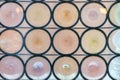 High res small pale pink circle Stained Glass Window close up texture background