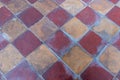 High res weathered geometrical square earth tone colored pale terracotta tiles background floor Royalty Free Stock Photo