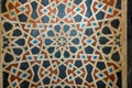 High Res weathered pale multi color mosaic arabesque design wall close up from Egypt