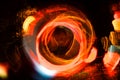High resolution Abstract glowing circle motion blurred background in dark vivid red, green, yellow, blue Royalty Free Stock Photo