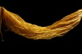 Unraveling Safety: A Captivating Abstract Photograph of a Yellow Nylon Rope