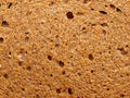 High resolution brown bread texture background. Texture of brown bread baked from rye flour Royalty Free Stock Photo