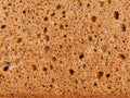 High resolution brown bread texture background. Texture of brown bread baked from rye flour Royalty Free Stock Photo