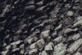 High-resolution closeup shot of a distressed stone wall with natural texture and weathering