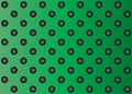 Green metal stainless steel aluminum perforated pattern texture mesh background Royalty Free Stock Photo