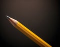 Sharp Yellow Pencil with Freshly Sharpened Tip on Smooth Surface Royalty Free Stock Photo