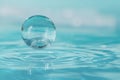 Crystal Clear Water Bubble on Tranquil Surface, Purity Concept Royalty Free Stock Photo