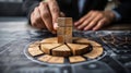 Business Strategy Concept Image with Wooden Blocks. Hand Stacking Cubes on Circular Chart in Office Environment