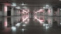 A stunning image of Indoor parking structure with fluorescent lights and reflections architectural Royalty Free Stock Photo