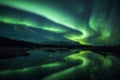 Northern lights above a lagoon in Iceland Royalty Free Stock Photo