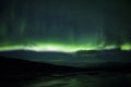 Northern lights above a lagoon in Iceland