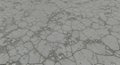 Cracked Concrete Ground Texture: Weathered Surface with Irregular Cracks Royalty Free Stock Photo