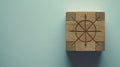 Intricate Wooden Cube with Engraved Compass Rose Design Arrows and Geometric Pattern AI generated. Royalty Free Stock Photo