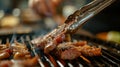 Chef grilling beef steak on barbecue grill, closeup view