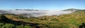 High resolution panorama - typical Madagascar landscape at Alakamisy Ambohimaha region fog rolls over green valley with terraced
