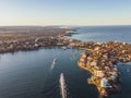 High resolution panoramic high angle drone view of Manly Beach, North Head and the Sydney Harbour area.