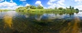 High resolution photo, panorama of summer landscape on the river, forest and clouds, August