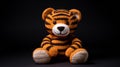 High Resolution Striped Knitted Tiger Toy On Black Background