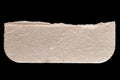 Torn beige paper scrap isolated on black background Royalty Free Stock Photo