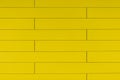 High resolution yellow plastic wall background with brick form Royalty Free Stock Photo