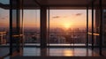 A high-rise balcony with soft sunset reflections on its glass windows Royalty Free Stock Photo