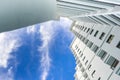 High rise building and bright blue sky Royalty Free Stock Photo