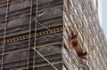 Dark Cladding on Construction Site Scaffolding Royalty Free Stock Photo