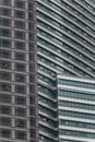 High-rise building facade with glass ans steel near Petronas twin towers in Kuala Lumpur, Malaysia Royalty Free Stock Photo