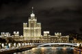 High-rise building on Kotelnicheskaya embankment, Moscow, Russia. New year illuminations on the Moskvoretskaya and Raushskaya