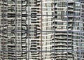 High rise building reflected in wavy glass window Royalty Free Stock Photo