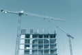 High-rise building under construction against blue sky Royalty Free Stock Photo